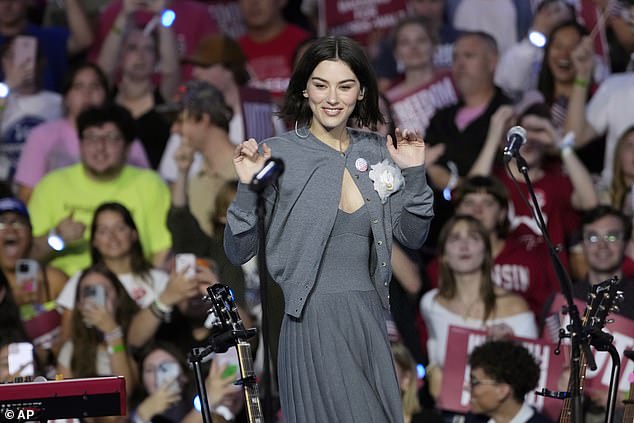 Singer Gracie Abrams surveys the crowd before performing at the vice president's Get Out the Vote rally in Madison on Oct. 30.