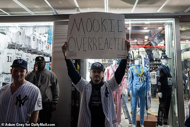 Yankees fan defends his team with homemade sign for Mookie Betts