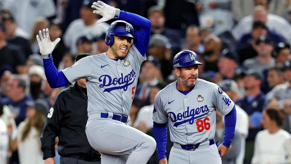 Los Angeles Dodgers first baseman Freddie Freeman celebrates after driving in two runs in the fifth inning.