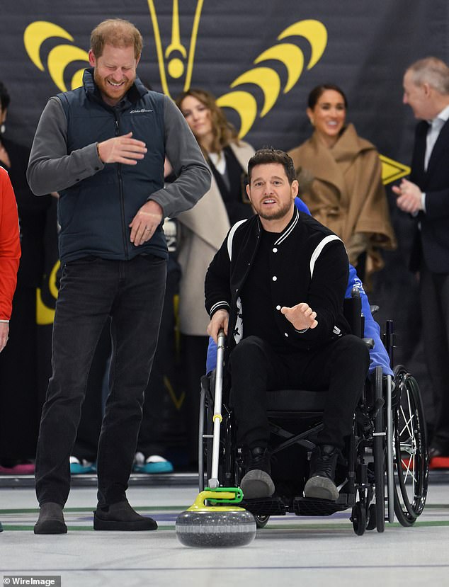 Prince Harry photographed with singer Michael Bublé at an Invictus Games event this year