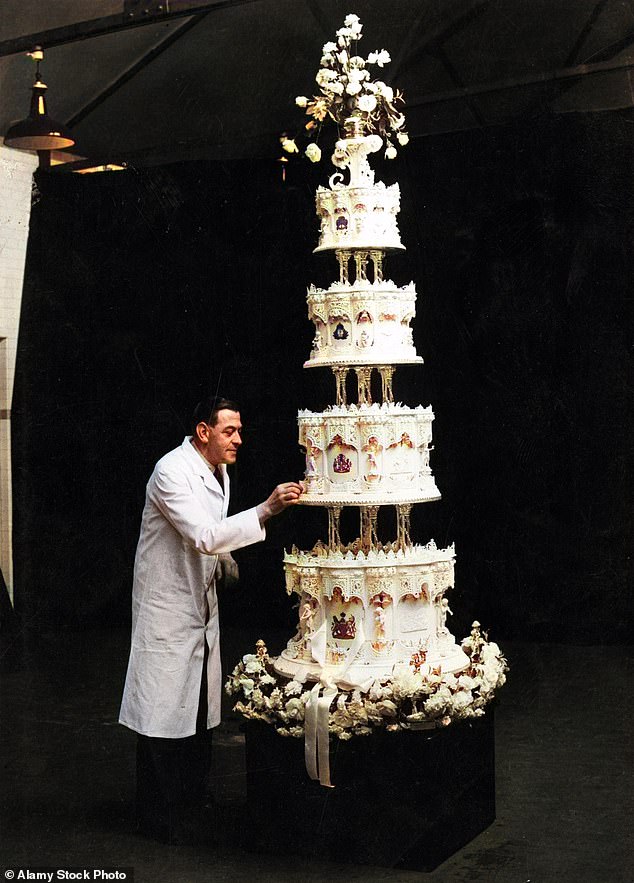 The royal couple's lavish cake measured a whopping 9 feet tall and consisted of four tiers.