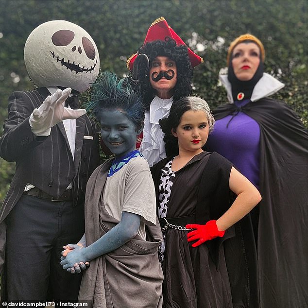 David Campbell dressed up as Captain Hook and posed with his family