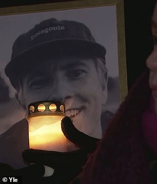 In the photo: Candles lit at a monument to Janne in Helsinki