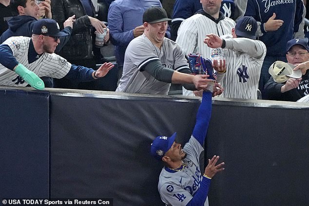 The fan in question drew a lot of attention on social media when people noticed his glove.