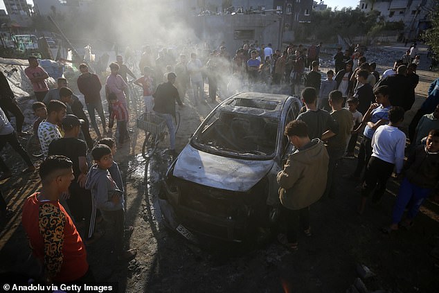 A view of the vehicle that was destroyed after Israeli attacks on the Maghazi refugee camp in Deir al-Balah, Gaza, on October 30, 2024.