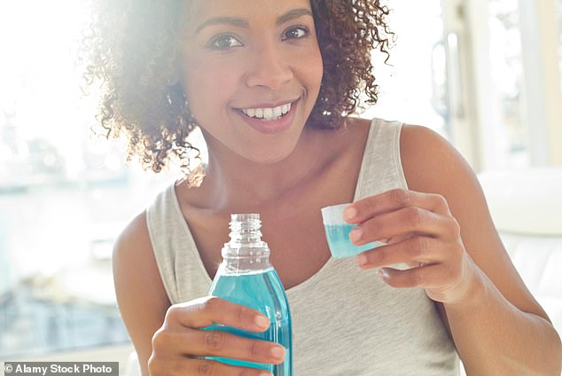 Scientists at the Institute of Tropical Medicine in Antwerp, Belgium, found that two species of bacteria were more prevalent after three months of daily mouthwash use (file image)