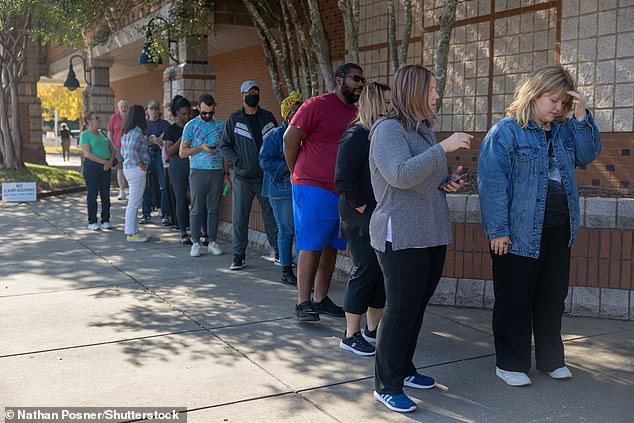 Voters wait in line to cast their ballots during early voting in Mecklenburg County, North Carolina, on Oct. 25, 2024, as reports emerged that Black voters are not turning out in the same numbers as years before.