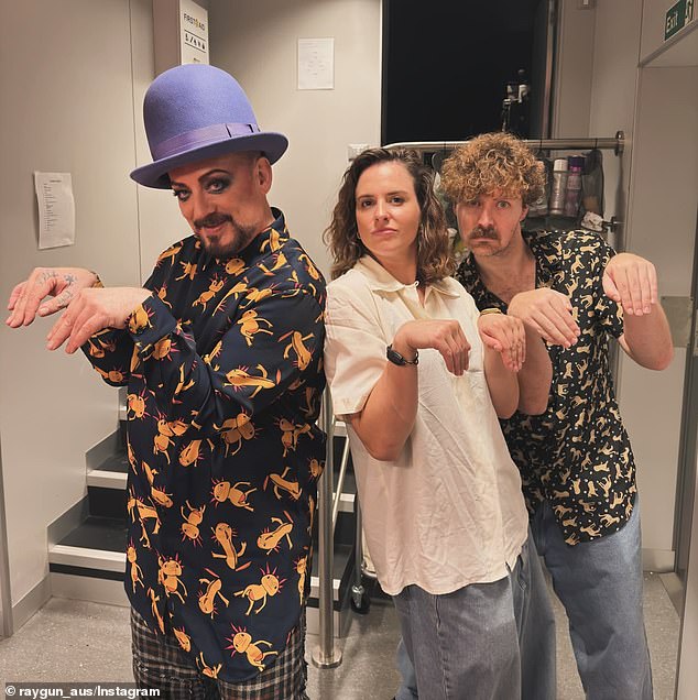 Raygun (centre) posed for the camera alongside Boy George (left), with the British singer imitating his infamous kangaroo jump from the Olympics.