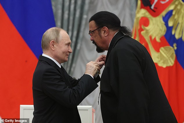 Putin presents the Order of Friendship to Seagal during an awards ceremony at the Kremlin in May.