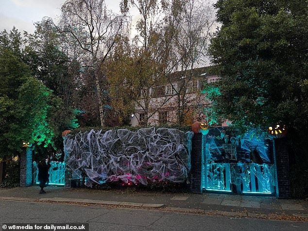 Jonathan's entrance to his house was also decorated with spooky pumpkins and cobwebs.