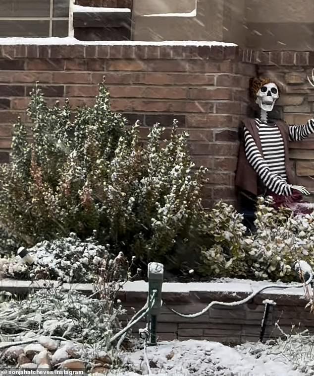 A Wyoming woman showed off her snow-covered Halloween decorations, hoping it would clear up before the actual holiday.