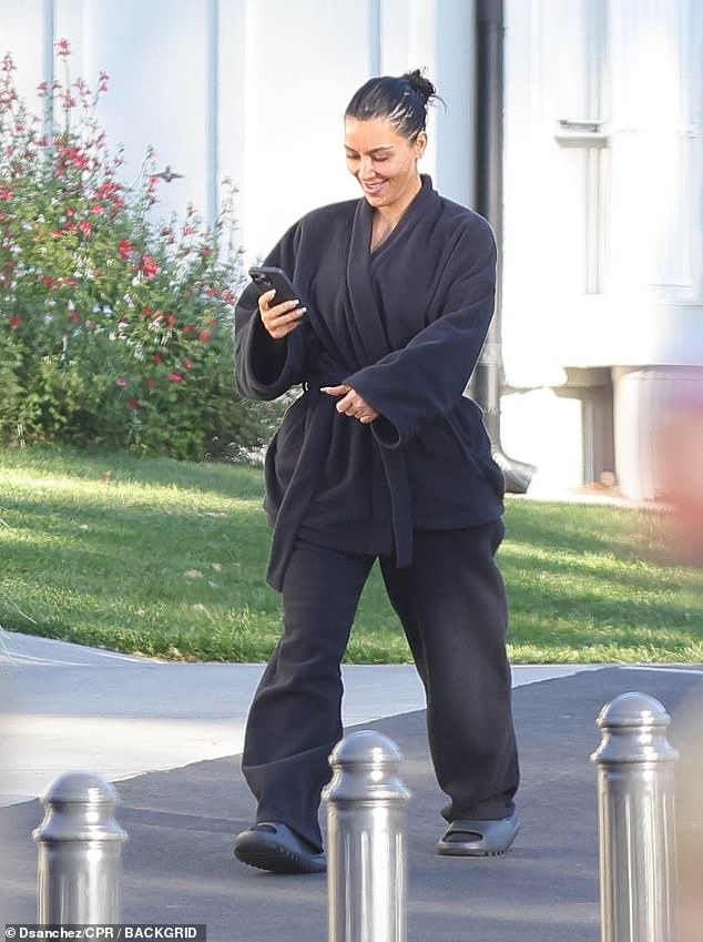 Kim looked casually cool in her all-black ensemble.