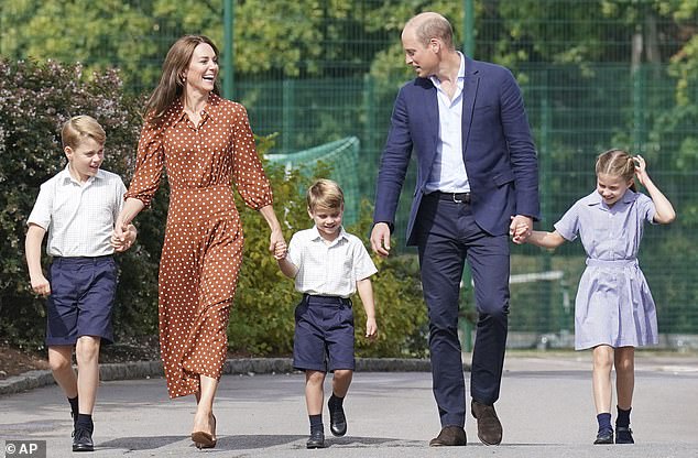 Prince George, Kate (then Duchess of Cambridge), Prince Louis, Prince William and Princess Charlotte arrive to settle in for the afternoon at Lambrook School in 2022.