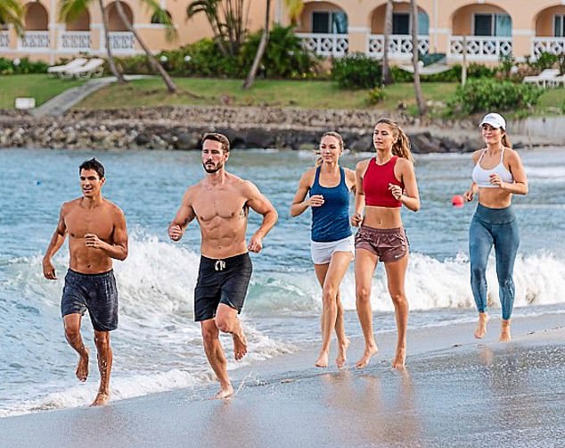 Lots to choose from: BodyHoliday offers a complete program of activities. Above, guests enjoy a race on the beach (file photo)