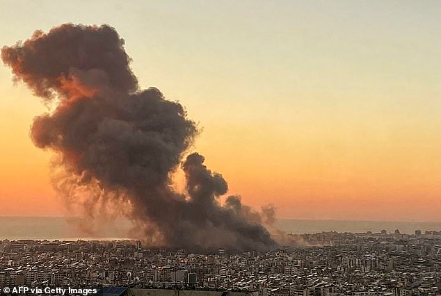 Smoke rises over Beirut's southern suburbs during the Israeli attack on September 27.