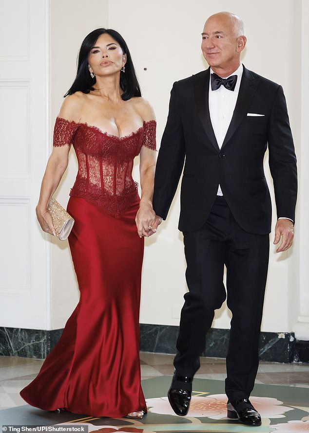 Amazon CEO Jeff Bezos and Lauren Sanchez arrive to attend a state dinner in honor of Japanese Prime Minister Kishida Fumio hosted by US President Joe Biden and First Lady Jill Biden at the White House in Washington.