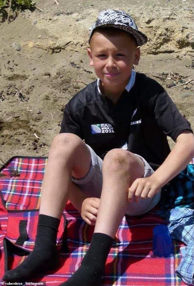 Love is pictured wearing an All Blacks jersey as a schoolboy