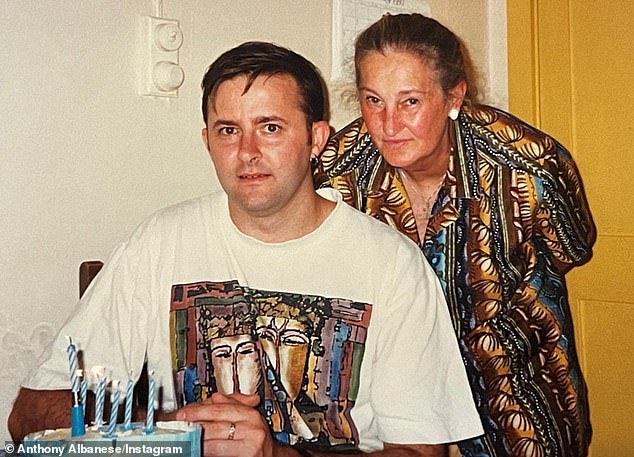 Having grown up in public housing, Mr Albanese (pictured with his mother) now enjoys an impressive property portfolio.