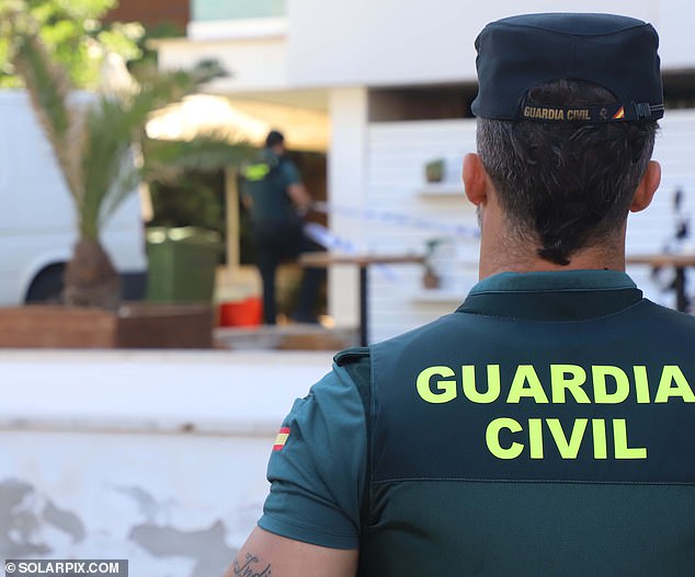 A police officer from the Spanish Civil Guard (file image). Authorities have not yet said whether they have established that drowning was the cause of death or whether they believe he suffered a prior health problem before getting into trouble. The Civil Guard appears at a court in Palma for the autopsy