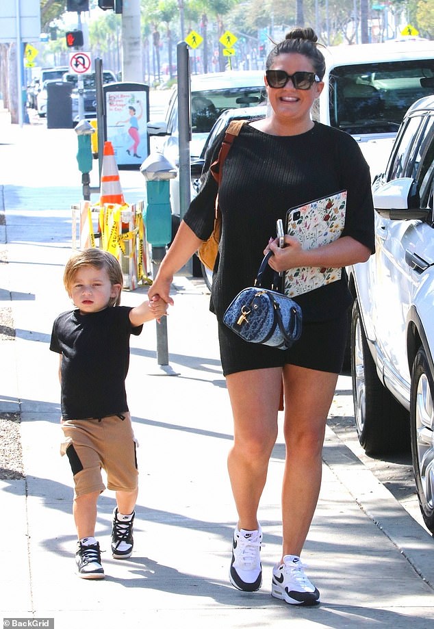 She had a big smile on her face and was a loving mother as she kept a close eye on her son. The reality TV personality even coordinated outfits with her son, as they both wore matching black t-shirts.