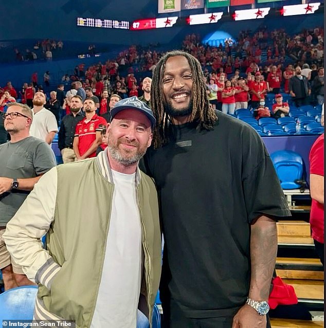 Sean Tribe (pictured left) rubbed shoulders with former West Coast Eagles AFL player Nic Naitanui during a Perth Wildcats game.