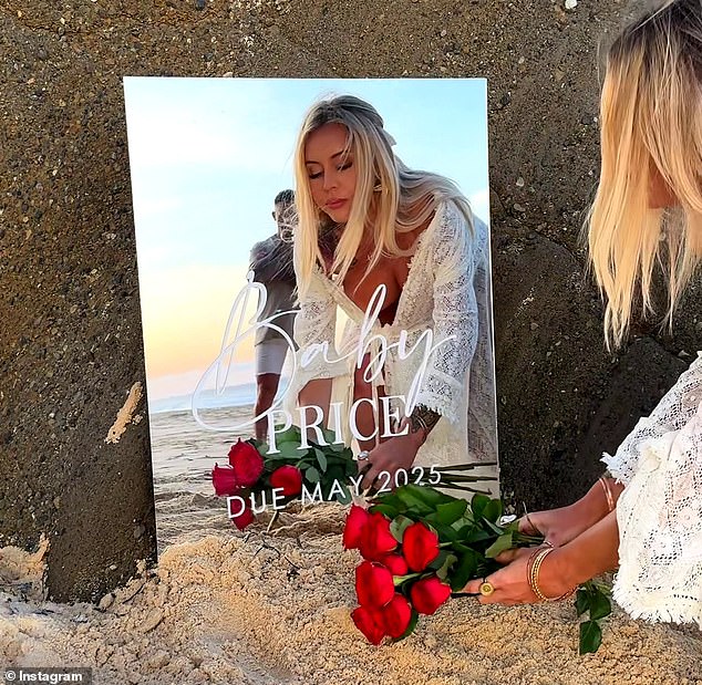 The 27-year-old shared a video on Instagram, which showed her placing red roses in front of a large glass sign that read 