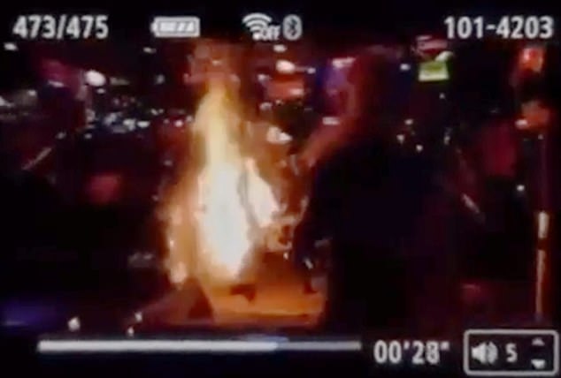 The 28-year-old's skirt suddenly caught fire, surrounding her in flames as shocked witnesses looked on.