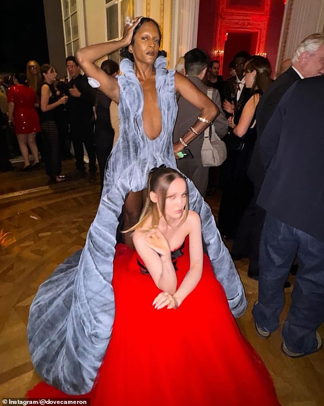 In an outtake, Dove posed with model and photographer Richie Shazam at the Business of Fashion 500 Gala.