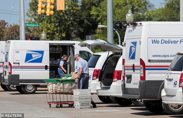 Oakland County Prosecutor Karen McDonald released a statement Friday claiming Valleau said he didn't want that 'black bitch' in his mailbox. He then called the mailman the same derogatory name and threatened her. PICTURED: Photo of USPS workers in Royal Oak, Michigan