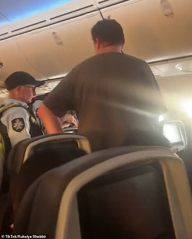 Police removed the man from the plane after it made an emergency landing in Darwin.