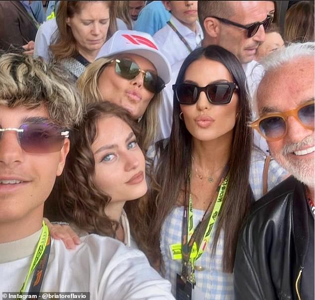 Reports from Italy have suggested that Briatore and his ex-wife Elisabetta Gregoraci (second right) may have rekindled their romance (Also pictured, Nathan Fiatore (front left) Heidi Klum (back left, Leni Klum (second to the left)