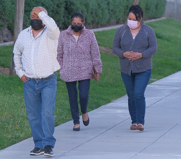 Marcelino, Rosa and Lennys Olguín pictured outside the courthouse in April 2023