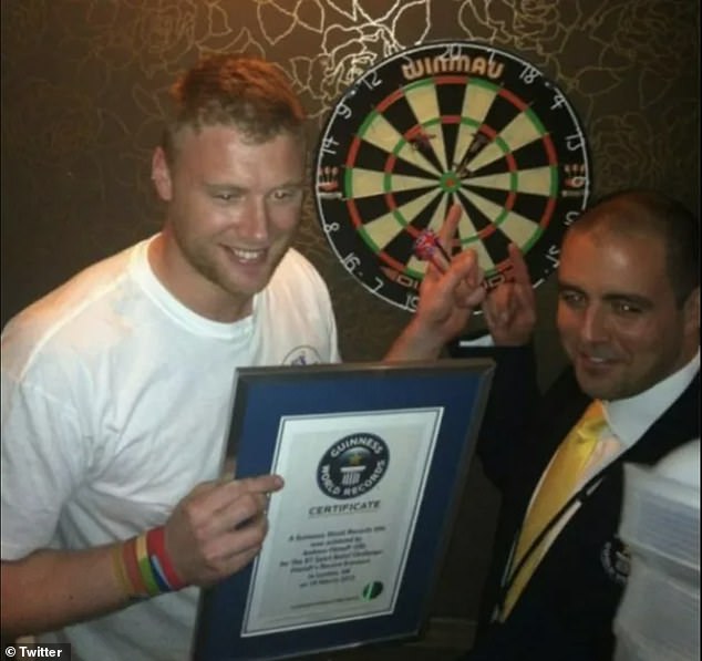 Freddie is a big fan of darts, he grew up playing with his friends and even holds a world record for the longest distance to throw a dartboard (pictured).