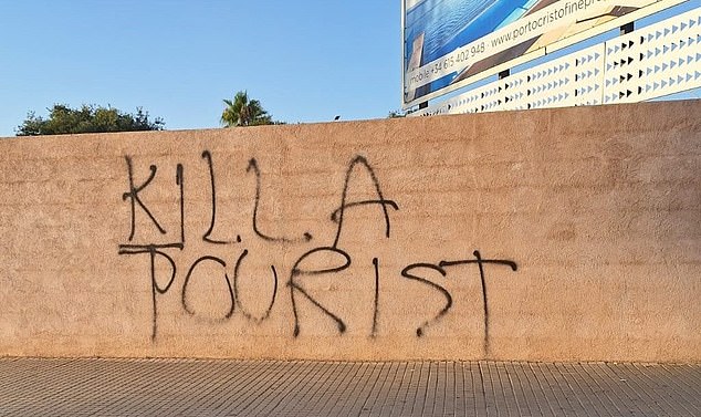 Anti-tourist protests escalate in a sinister turn when graffiti of 