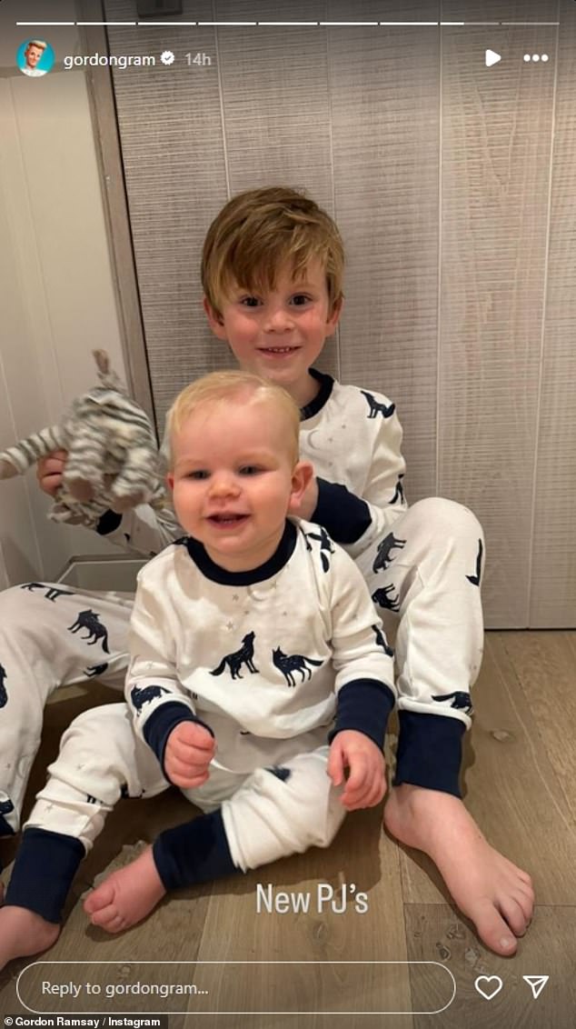 The celebrity chef later posted a photo of his two youngest children wearing matching white pajamas with a wolf print as they laughed while playing with a striped stuffed animal.