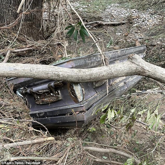 The coffin seen in the gruesome images was later recovered as part of a community clean-up.