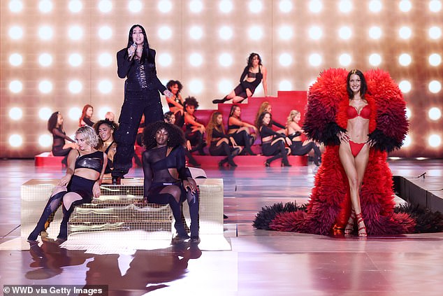 Cher and Bella Hadid on the runway at the Victoria's Secret Fashion Show held at the Brooklyn Navy Yard on October 15 in New York.