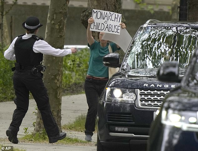 A police officer ran towards the protester outside the Foundling Museum before Kate's visit last year.