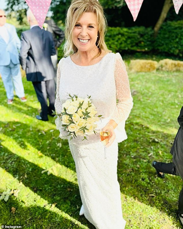 The presenter, 64, looked beautiful in a sparkling long-sleeved dress as she walked down the aisle carrying a bouquet of white roses to symbolize her husband was from Yorkshire.