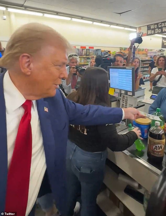 Donald Trump took $100 in cash from his wallet and handed it to a mother of three who was shopping at a local grocery chain in western Pennsylvania.