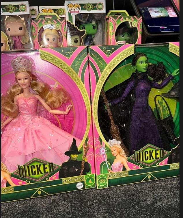 In another video in her home theater room, Kim showed off a selection of Wicked-inspired Barbie dolls for 