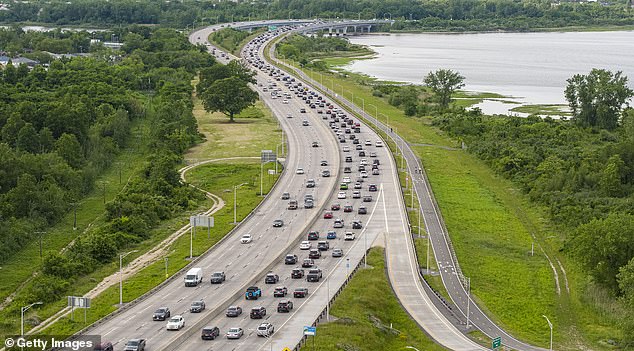 The video shows the vehicle, driven by the alleged scammers, proceeding down New York's Belt Parkway in Queens before stopping in front of the car of the dash cam driver, Ashipa Natasha, and narrowly missing it.