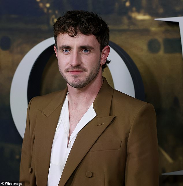 The Irish actor looked dapper in a brown suit as he led arrivals for the action film, which follows Russel Crowe's 2000 hit Gladiator.