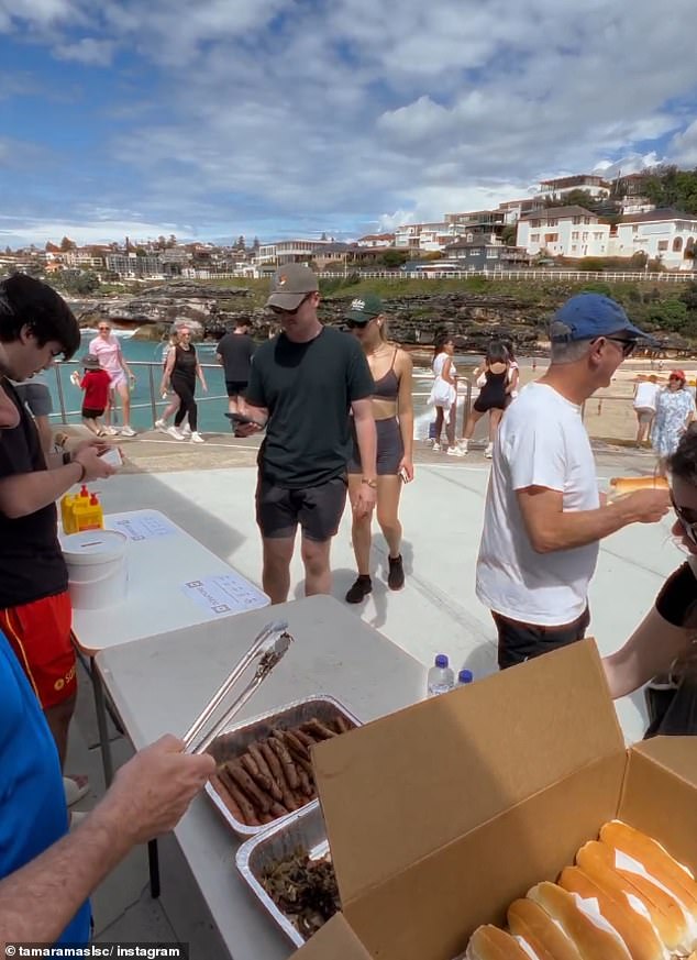 Dozens of social media users called the price of sausage rolls a joke (pictured, people serving sausage rolls at the Tamarama Surf Live Saving Club in Sydney)