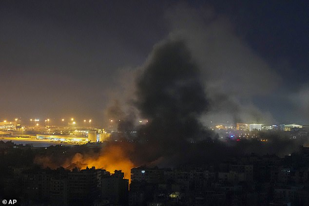 Smoke rises following an Israeli airstrike in Dahiyeh, Beirut, Lebanon, this afternoon.