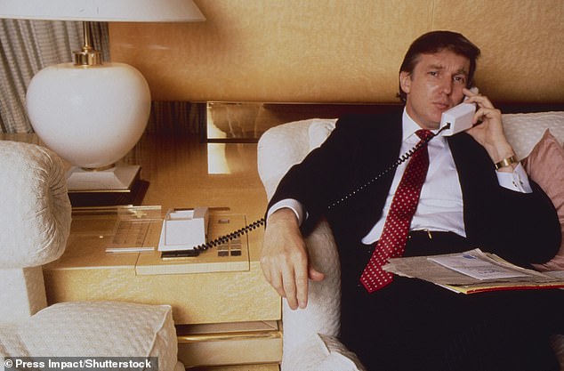 Trump is pictured answering a phone call aboard the Trump Princess in 1988.