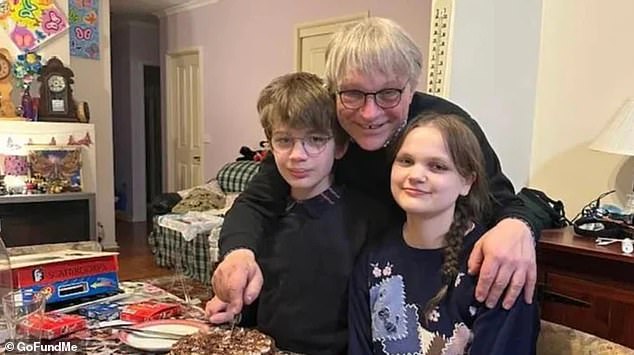 Jonathan Walker (pictured with two of his seven children) and his family were left with a ruined home and $10,000 in damage after a hail storm.