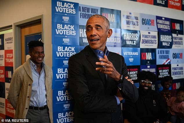 Former US President Barack Obama speaks with supporters at a campaign office in East Liberty, before a rally in support of Vice President Kamala Harris, in Pittsburgh.