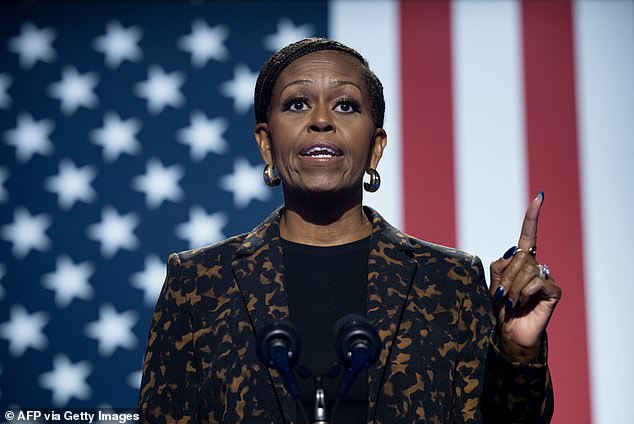 US First Lady Michelle Obama speaks during a rally with US Vice President and Democratic presidential candidate Kamala Harris at the Wings Event Center in Kalamazoo, Michigan.