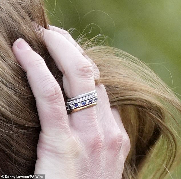 The mother of three opted for a fine gold ring, topped with what some have speculated is a new 